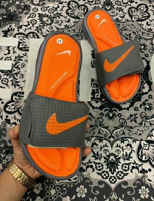 orange nike flip flops