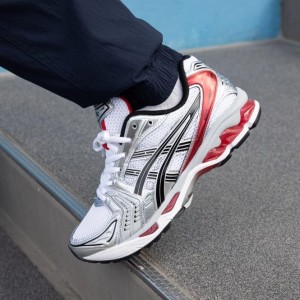 Asicss gel kayano orange and gruy
