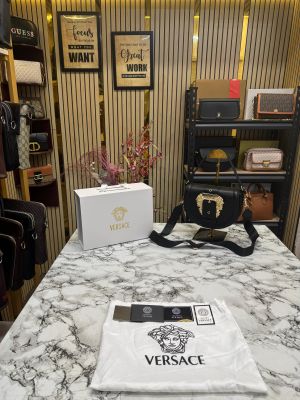 Versace shoulder bag in gold accents with magnetic closure bag (Black)