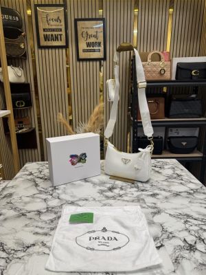 PRAD_A RE EDITION GLOSSY BAG WITH OG BOX DUST BAG CARD WHITE 