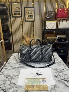 CHRISTIAN DIO_R DUFFLE PREMIUM QUALITY WITH DUST BAG SLING AND TAG (BLUE) (S20)