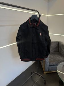 Gucc i black imported leather jacket with brand button