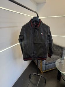 Gucc i dark brown imported leather jacket with brand button